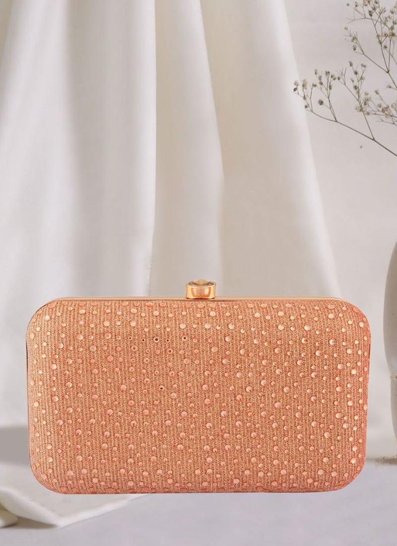 Sexy Clutches: How to Buy & Wear a Designer Clutch Bag
